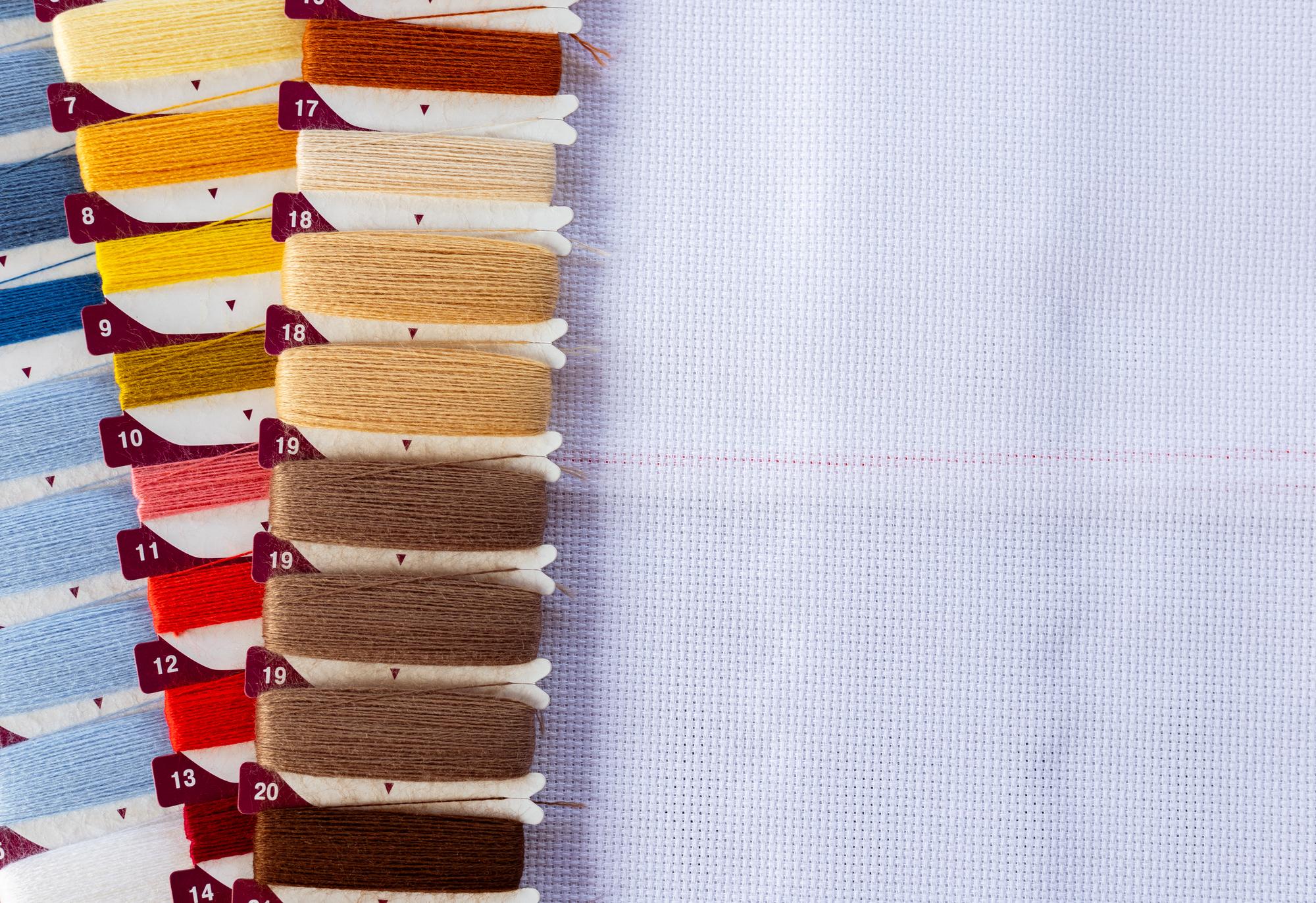 sample embroidery swatches arranged on paper